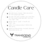 The image features a graphic titled "Candle Care" that provides instructions on how to use and maintain candles. It advises trimming the wick of the candle by 5mm before each use and allowing the wax to melt all the way to the glass edge before lighting for the first time. It also recommends burning the candle for at least 2 hours on the first use and keeping the candle away from kids and pets. The graphic has a decorative stars next to each instruction point and displays the Transcend Cosmetics logo.